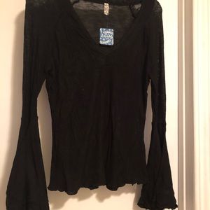Black v-neck top with bell sleeves by Free People